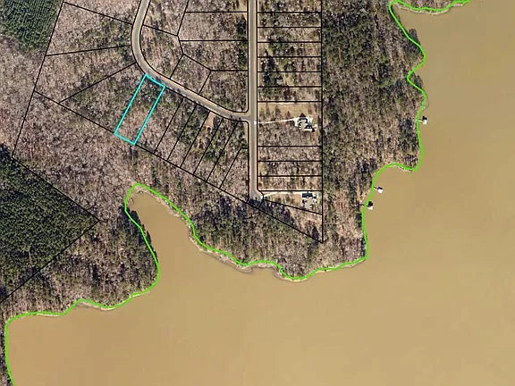 1.51 AC LAKEFRONT lot in Pointe Shores